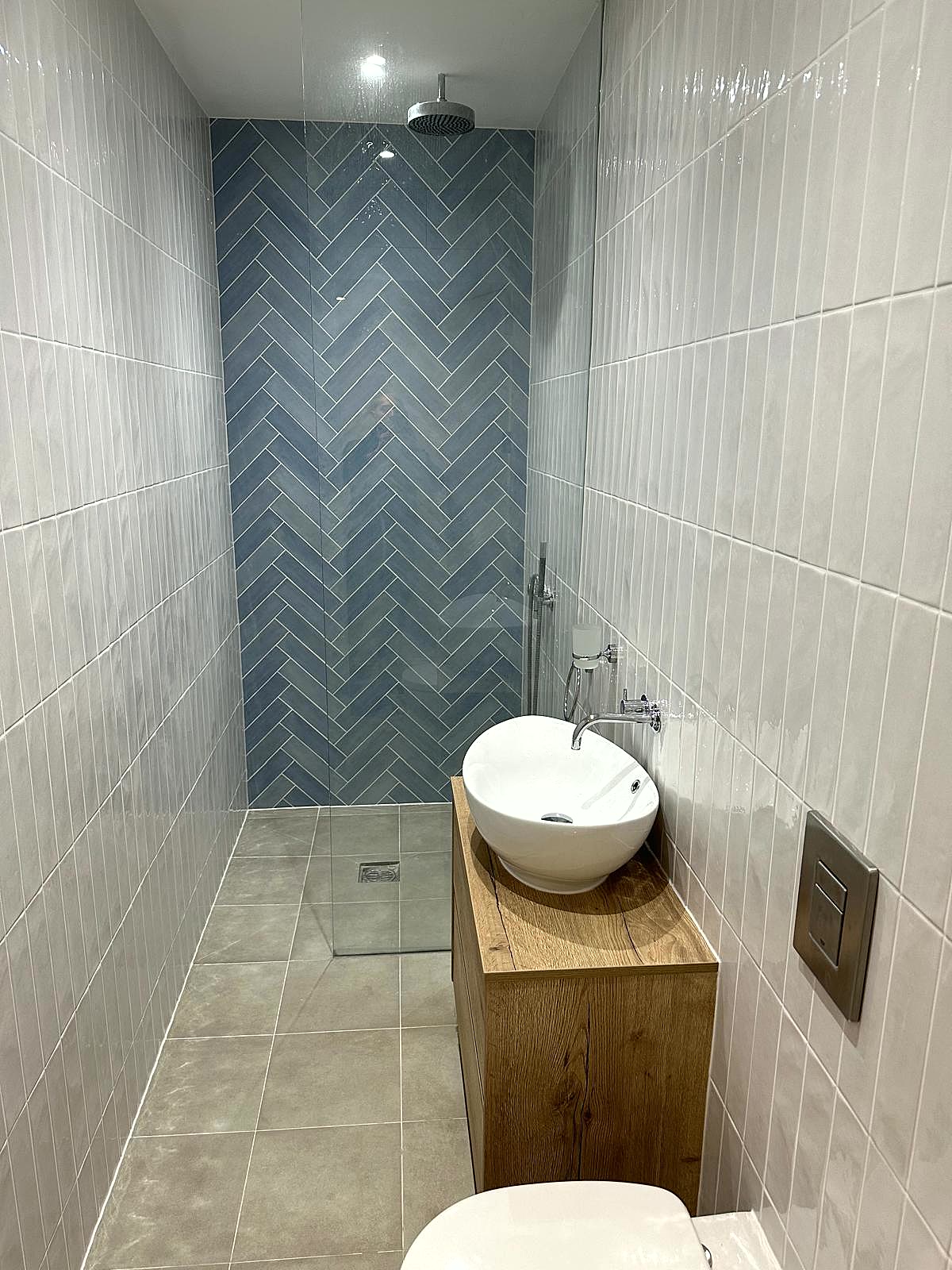 Bathroom renovation with feature tiling, London