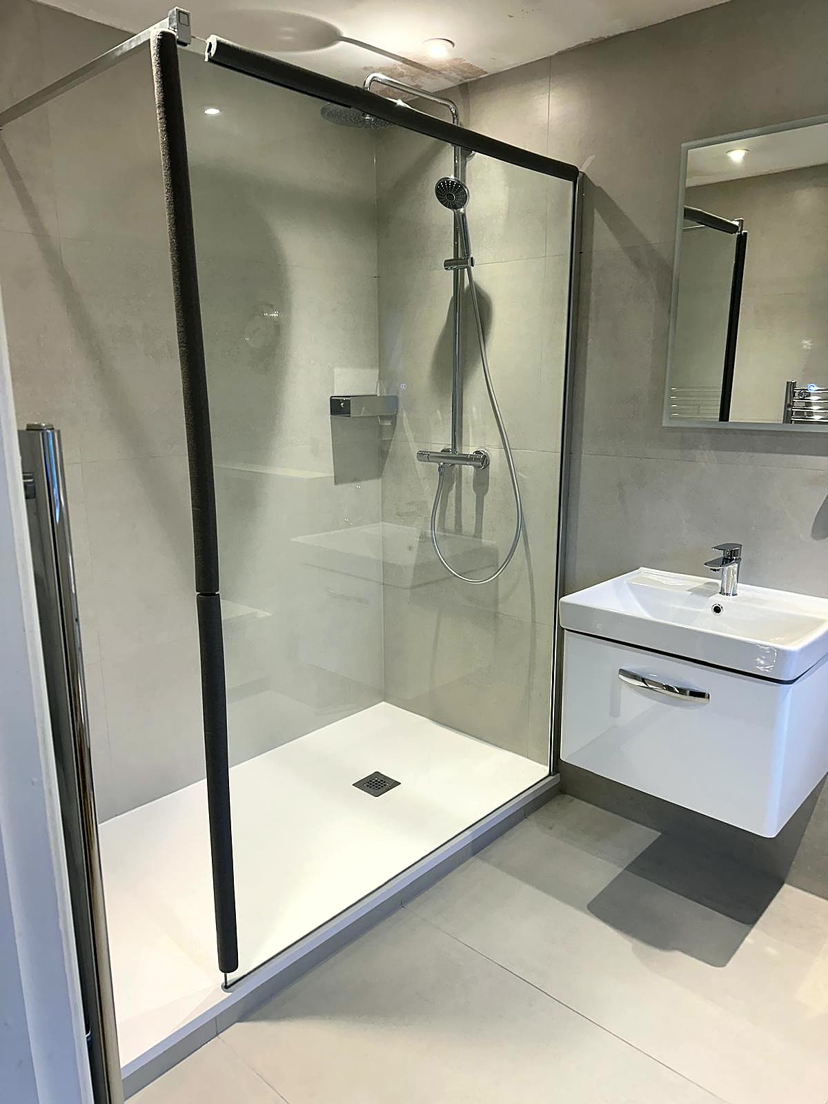 Finished bathroom with sanitaryware and tiling, London