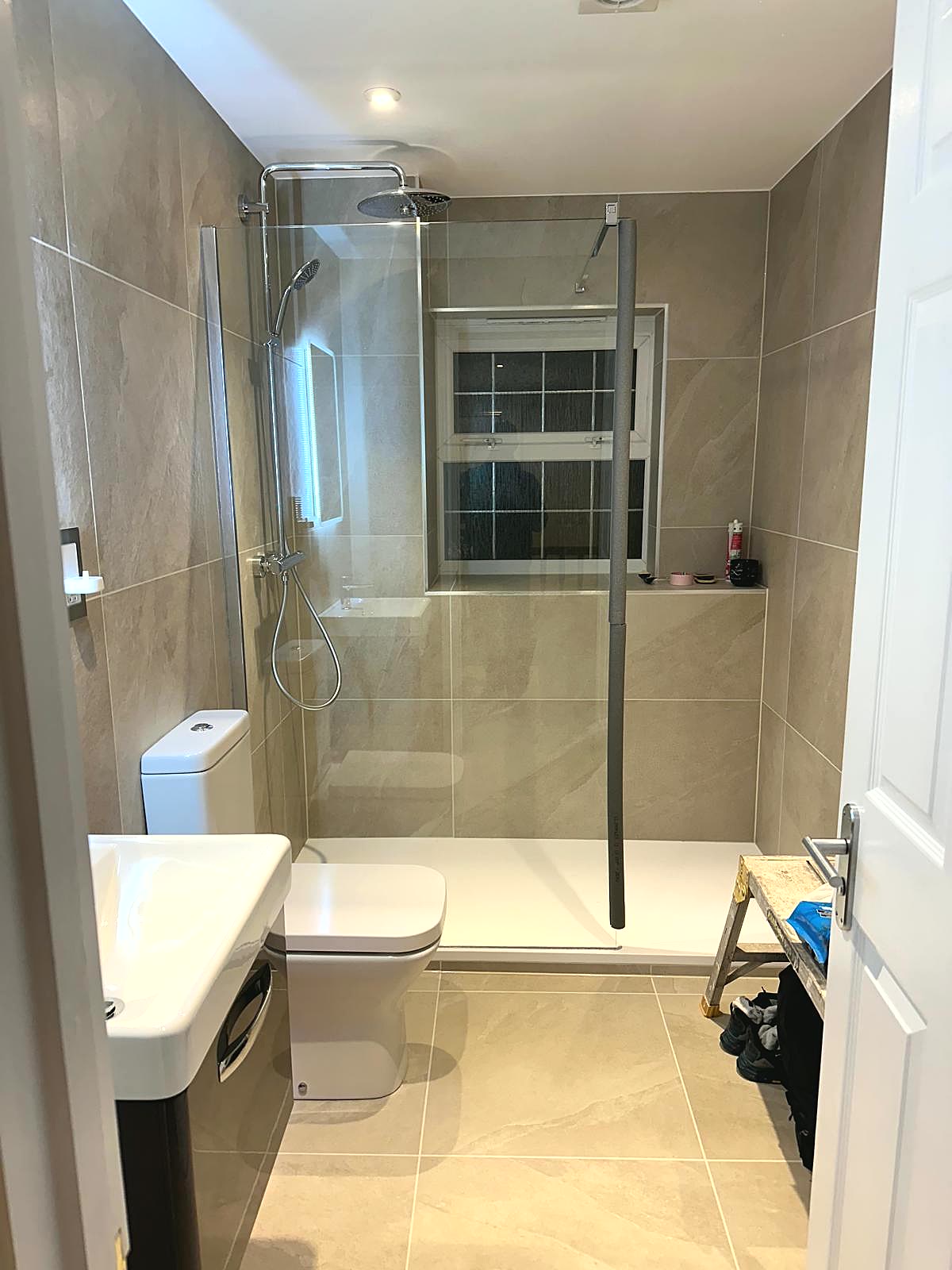 Family bathroom refit with bath and tiling, London